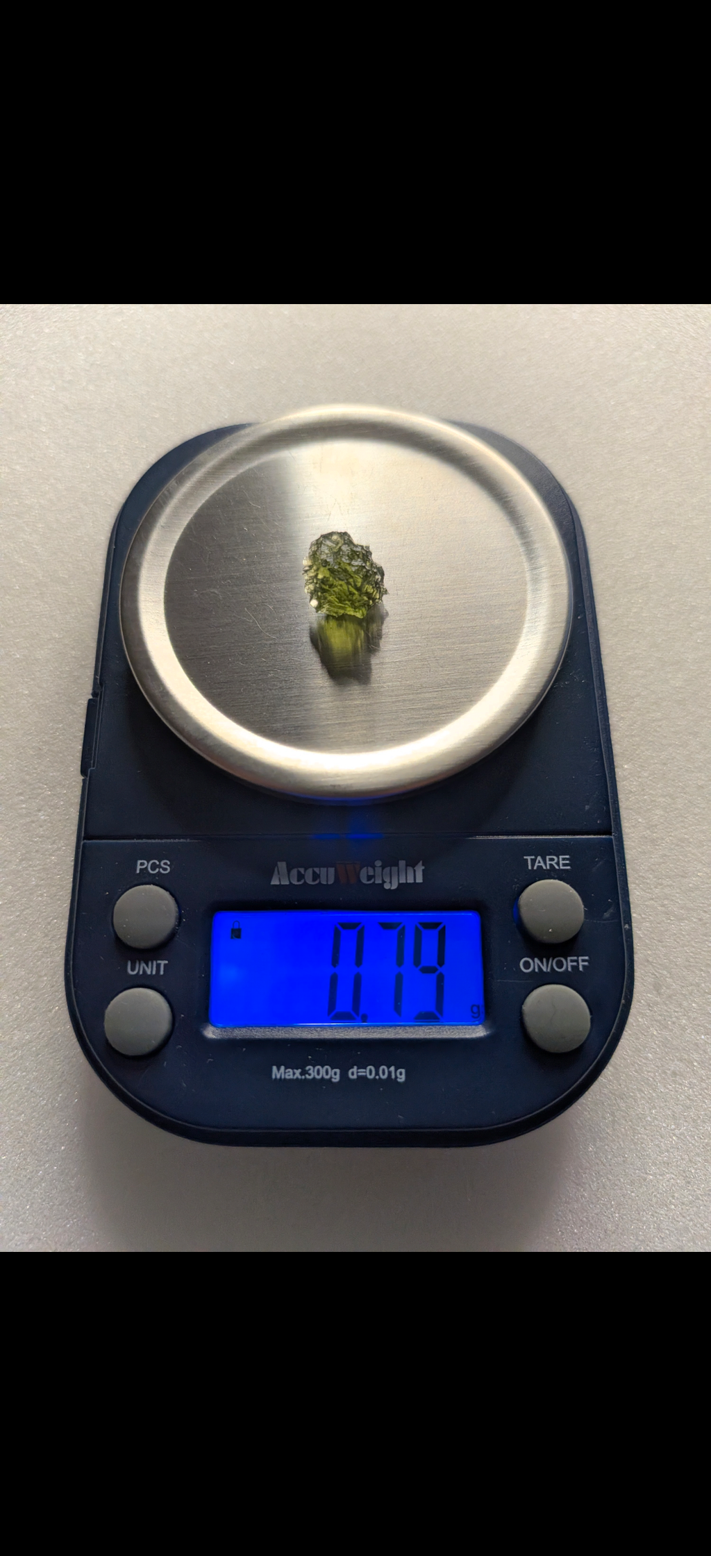 A++ Grade Small Ball Shaped Moldavite From Maly Chlum #21 - 0.79g (Copy)